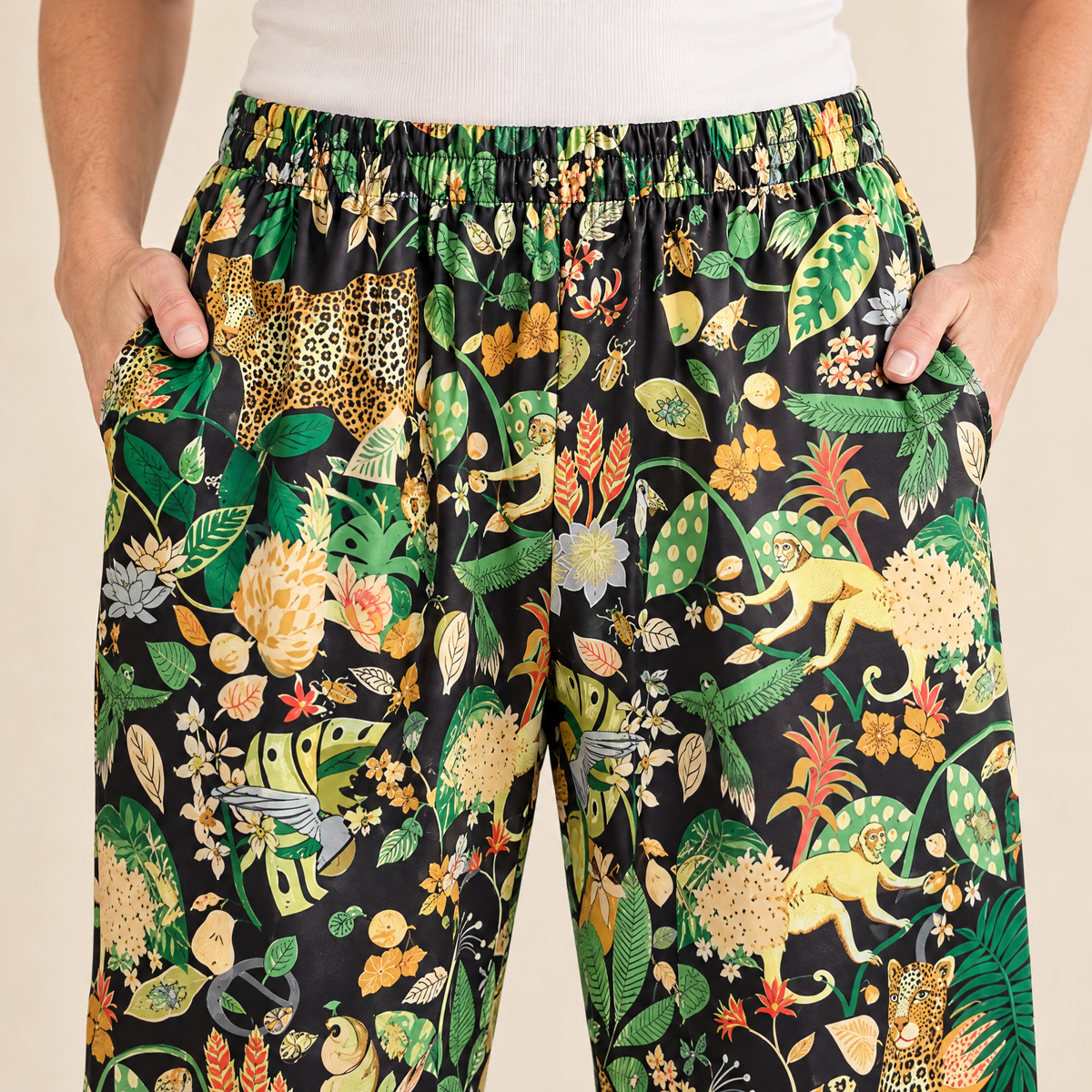 Close-up of the elasticated waistband on the Black Jungle Leopard satin pyjama trousers