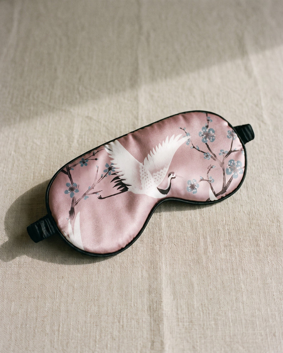 Night Owl Pyjamas Sakura Satin Eye Mask in pink, shown from the front