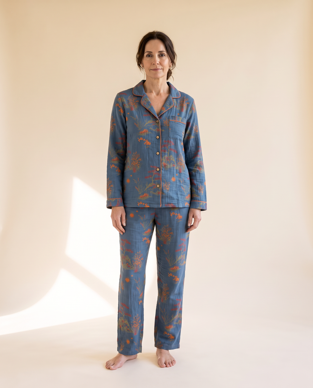 Oriental Bloom 100% cotton pyjamas in Teal Blue with orange piping, front view