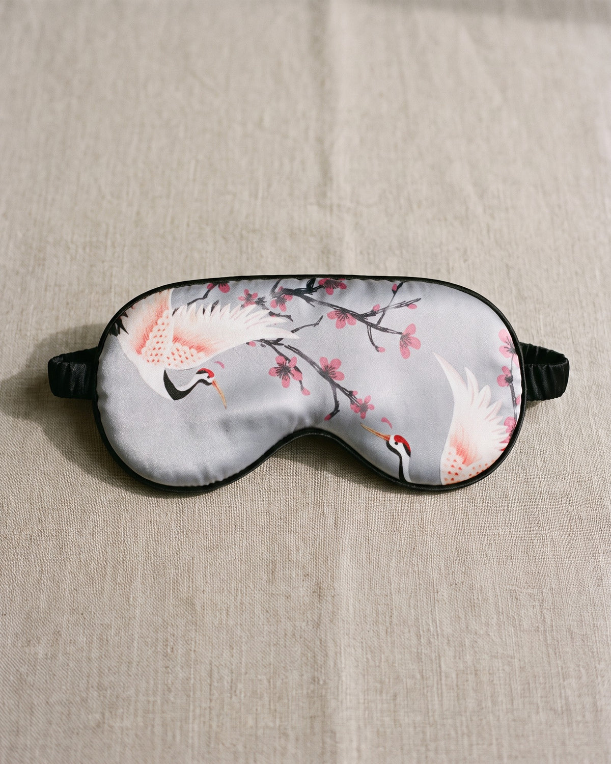 The Sakura Satin Eye Mask in Grey, front view